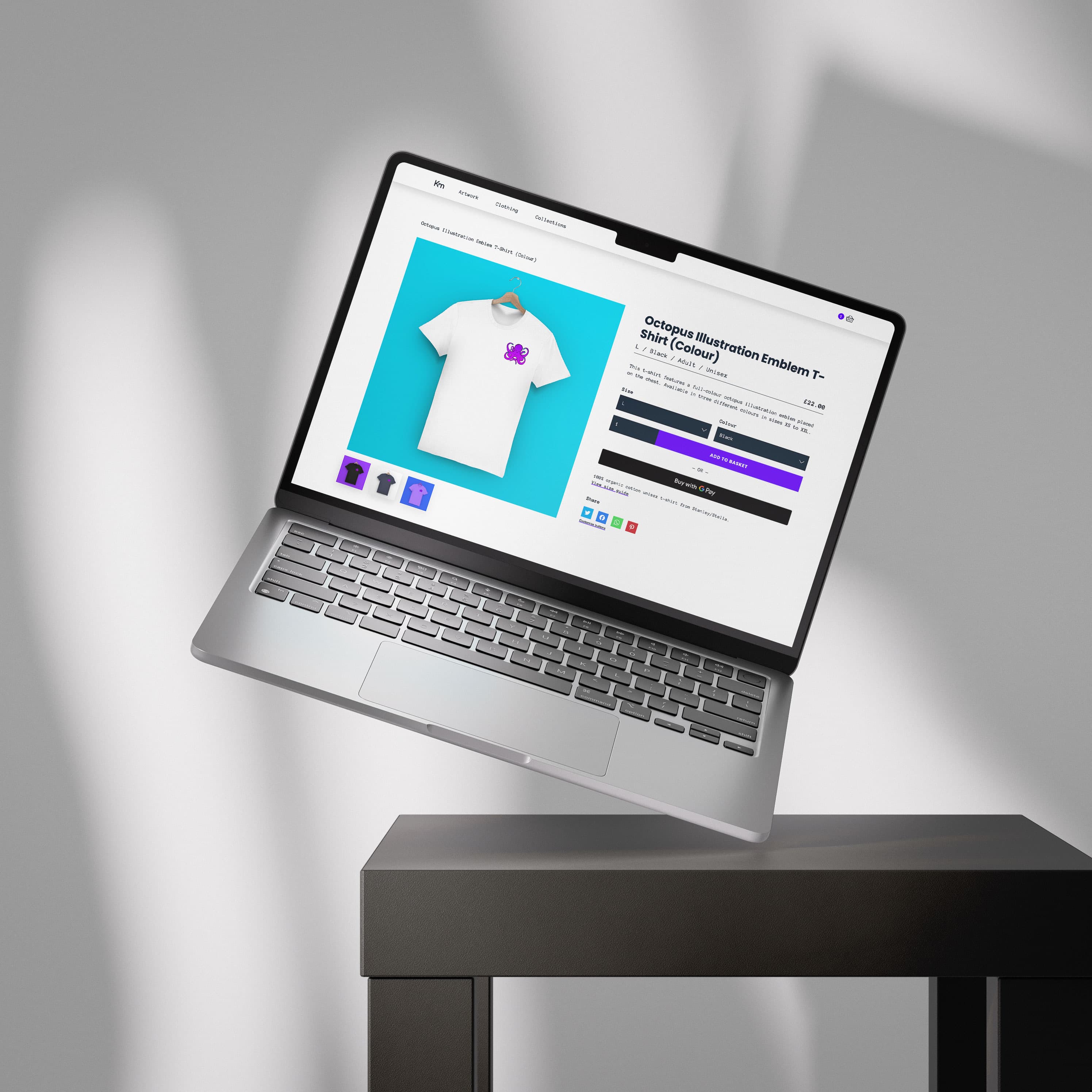 MacBook tilted at an angle showing off an e-commerce site