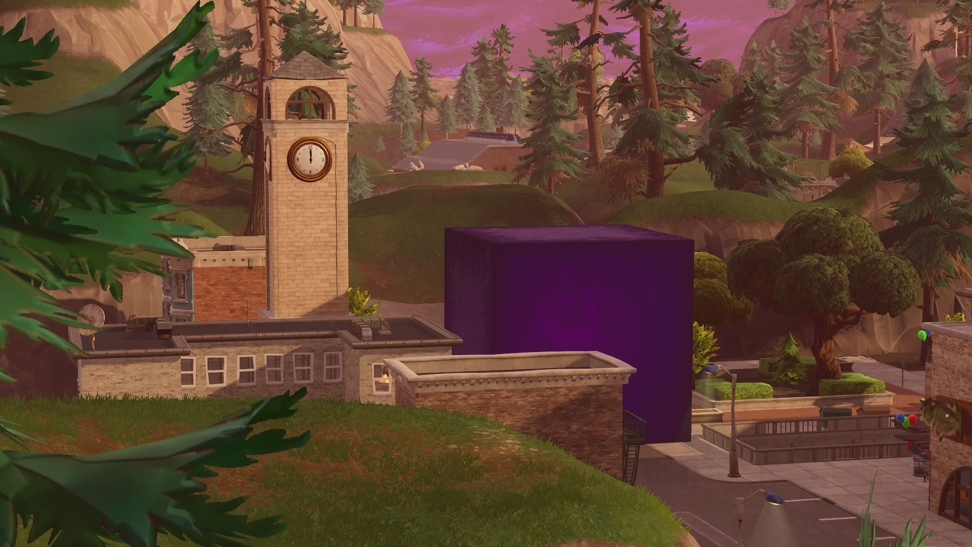A giant purple cube next to a clocktower