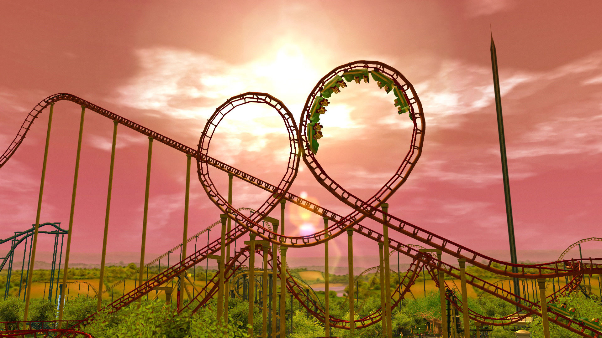 A giant loop the loop against a sunset in Rollercoaster Tycoon