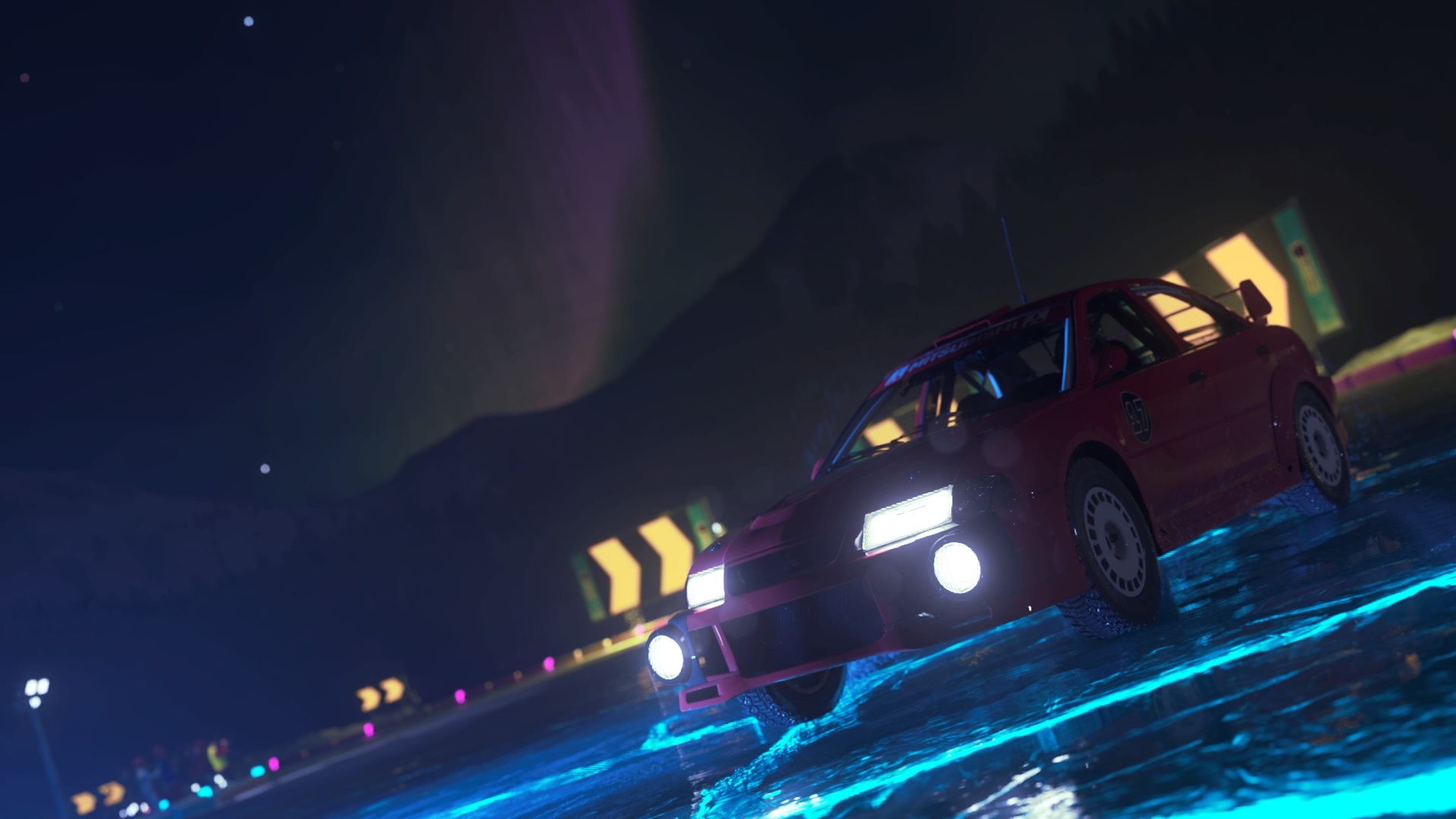 A rally car racing over ice